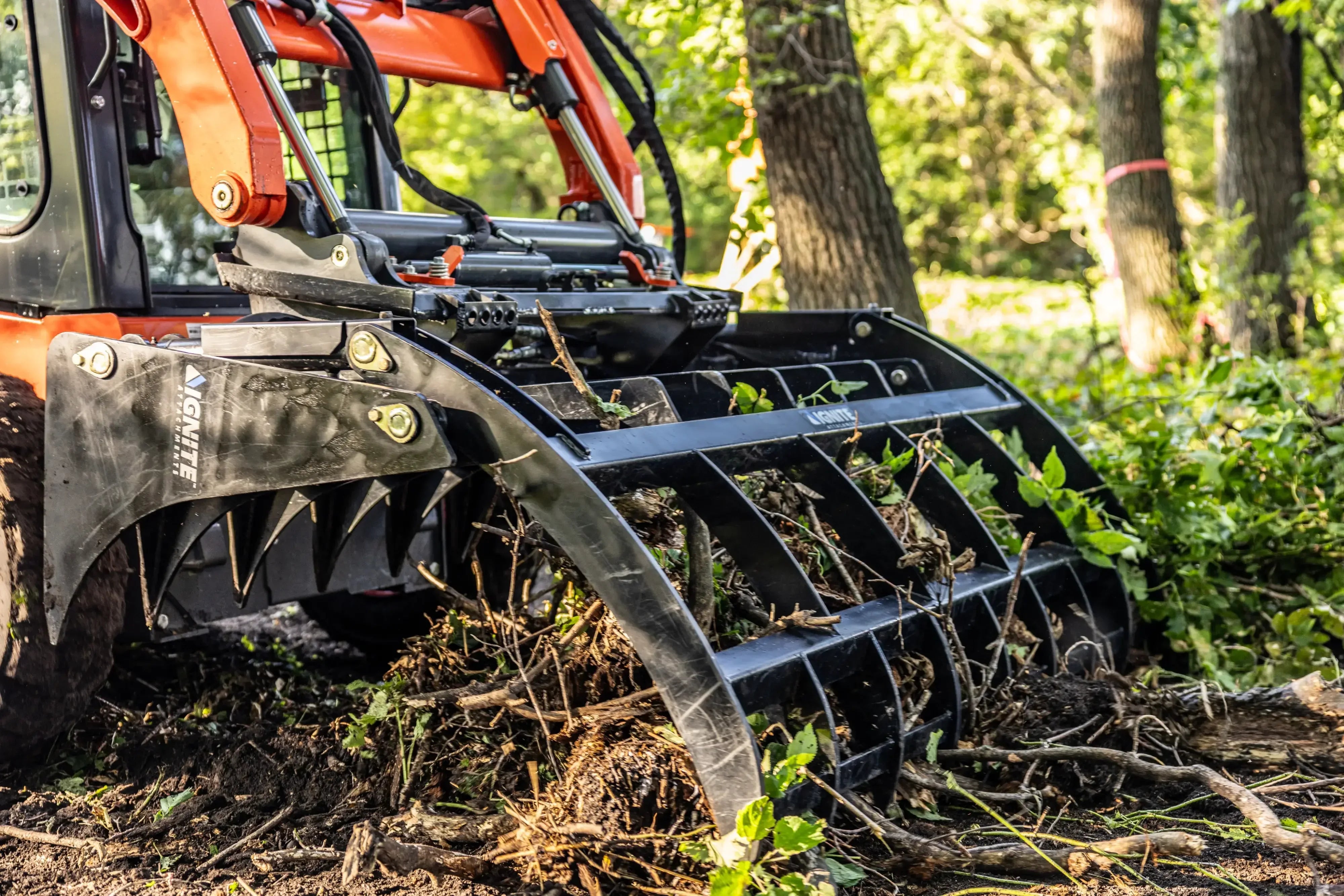 Ignite Attachments 66-Inch Rake Grapple | 2-in-1 Skid Steer Attachment for Land Clearing & Debris Loading - Log Bear Works