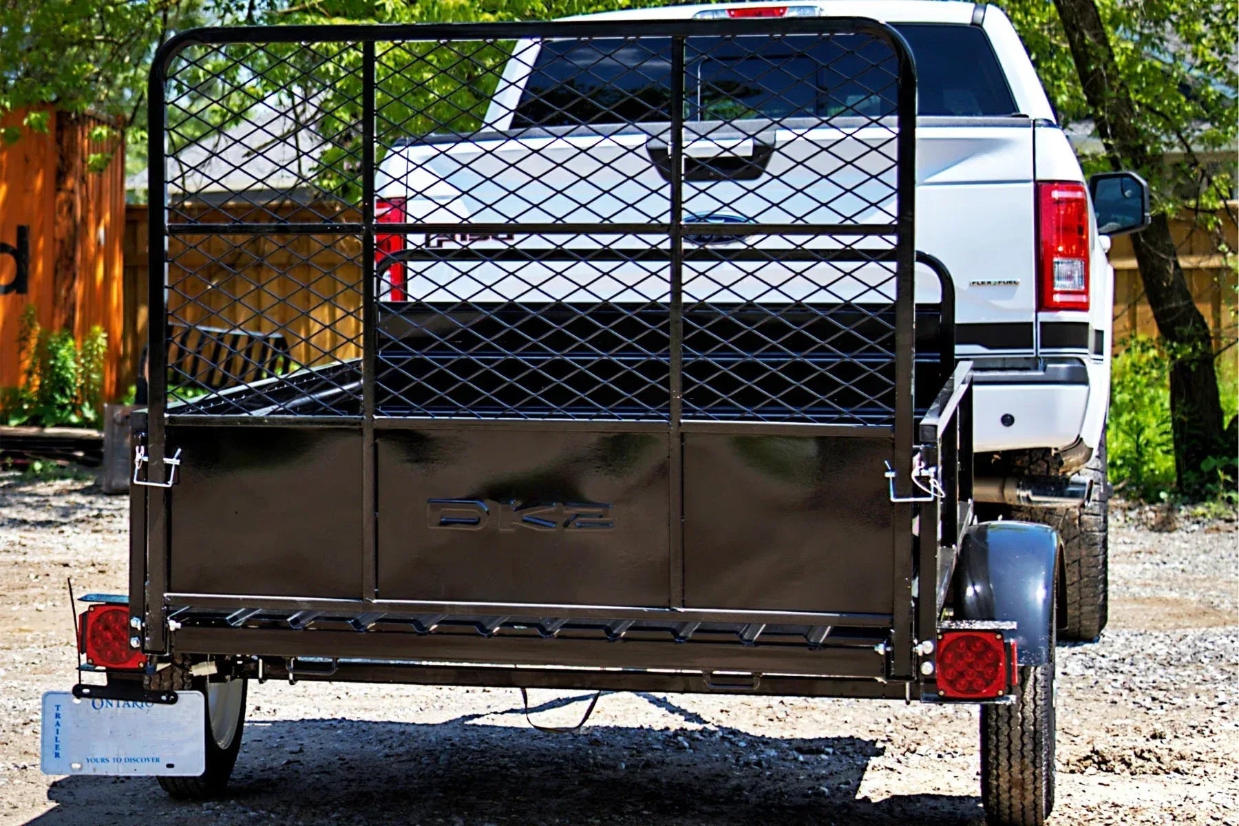 DK2 MMT5X7-DUG 4.5x7.5 Ft Steel Dump Utility Trailer | 1,624 LB Payload, 40-Inch Rear Ramp Gate, UV Powder-Coated - Log Bear Works